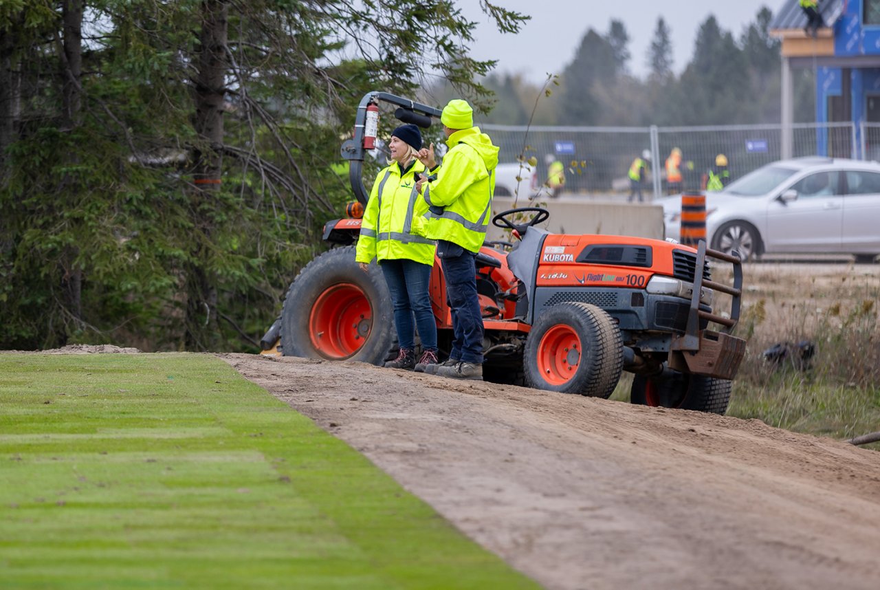 Two workers discussing.