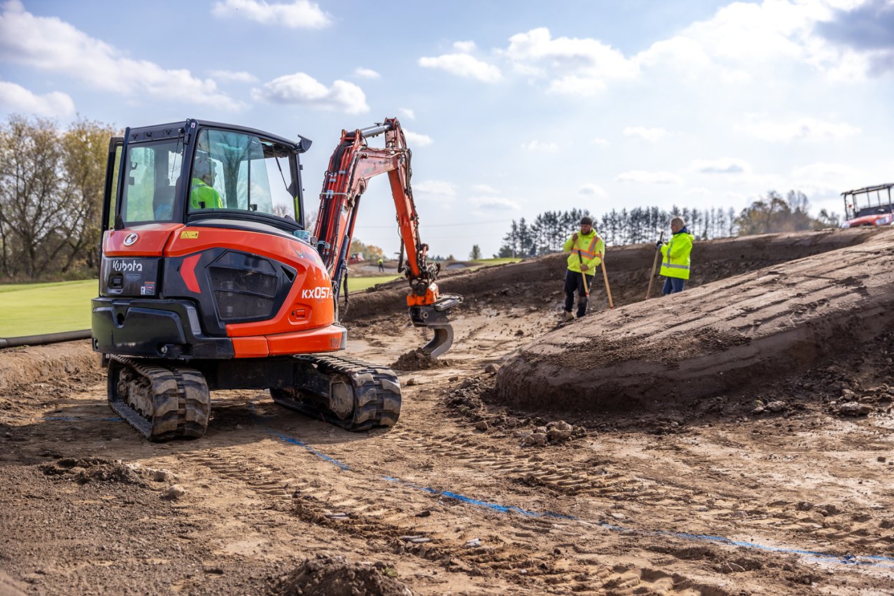 Backhoe digging.