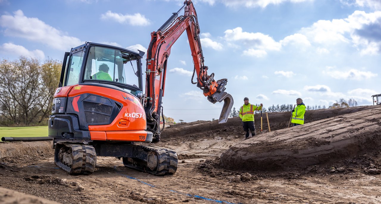 Backhoe digging.