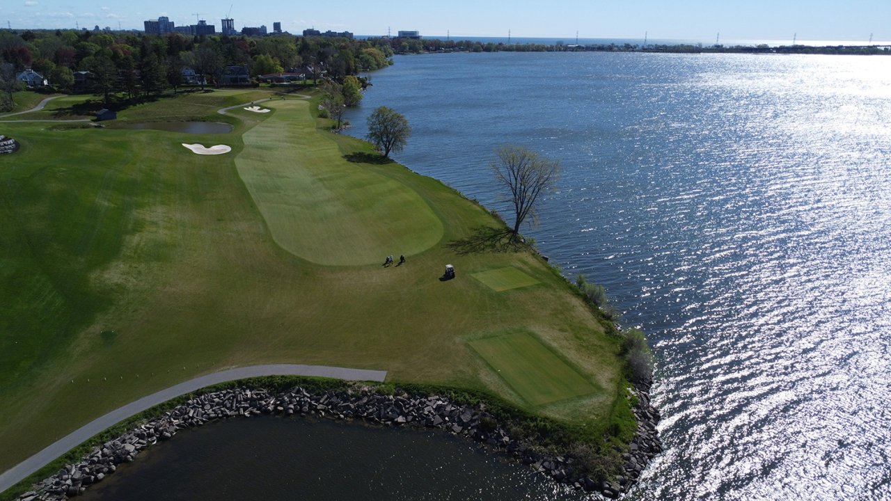 Golf course by the lake.